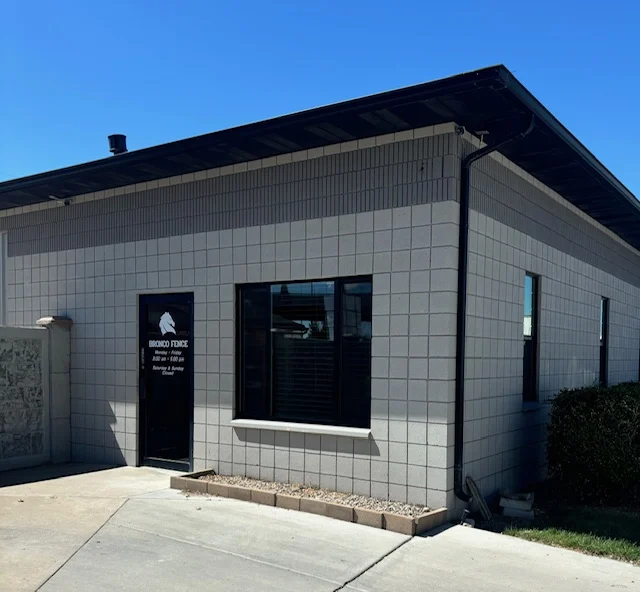 Bronco-Fence-Building-Front Contact