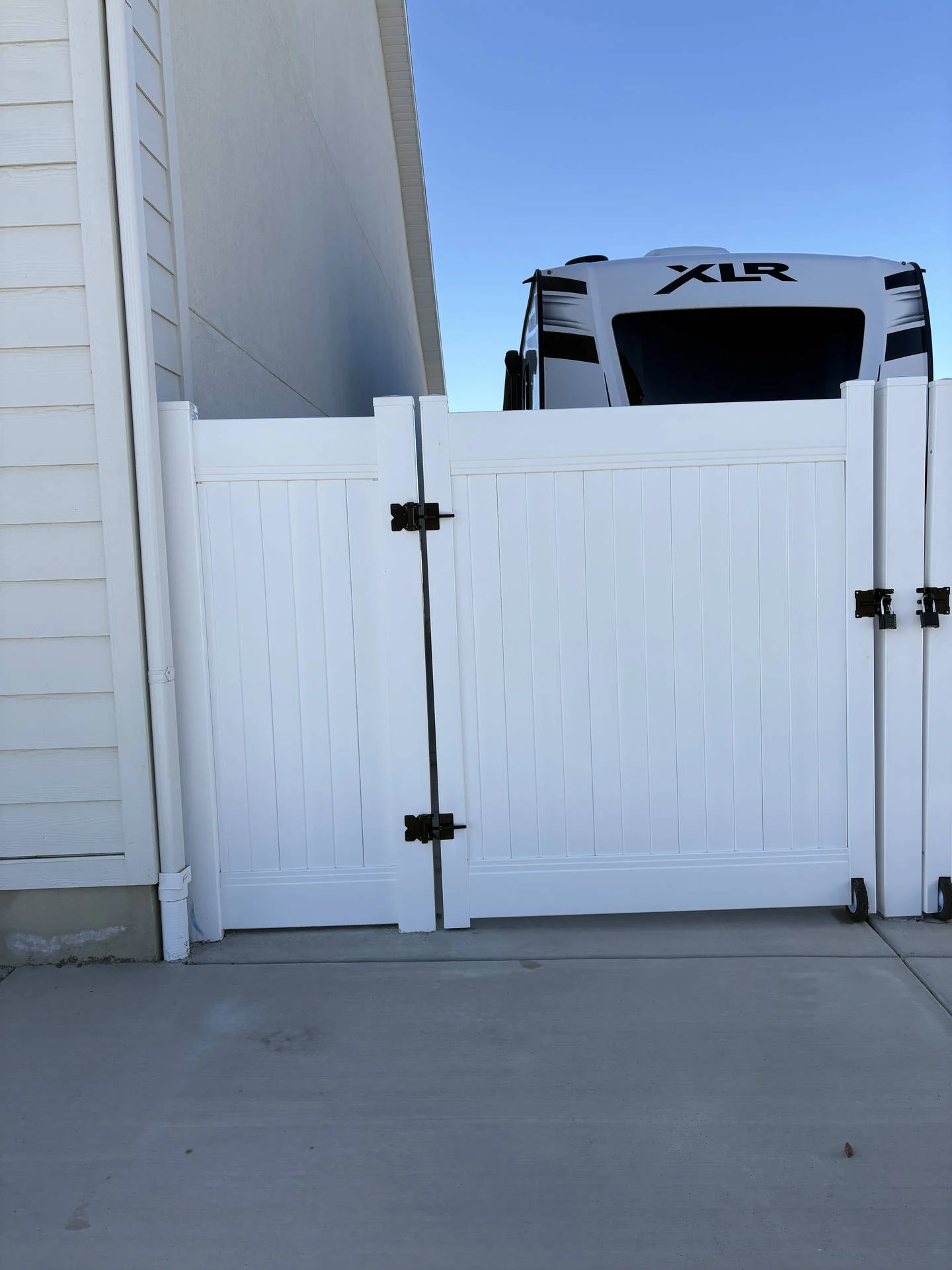 Hooper UT: Full Privacy White Vinyl Fence & Steel Gate