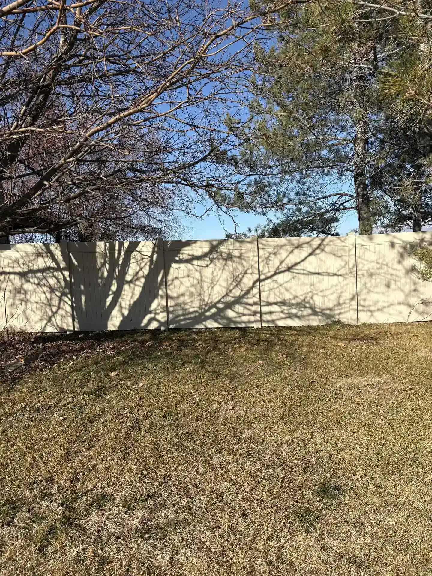 Recent Projects Taylor UT: Tan Vinyl Privacy Fence with Steel in pickets