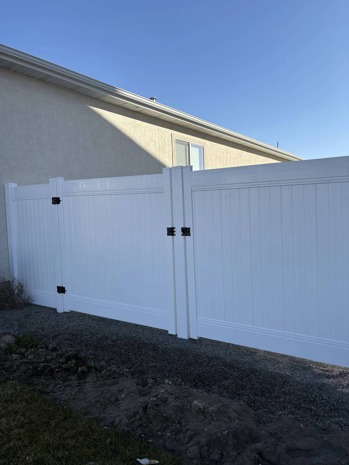 Taylor, UT: White Vinyl Privacy Fence & Double Gate