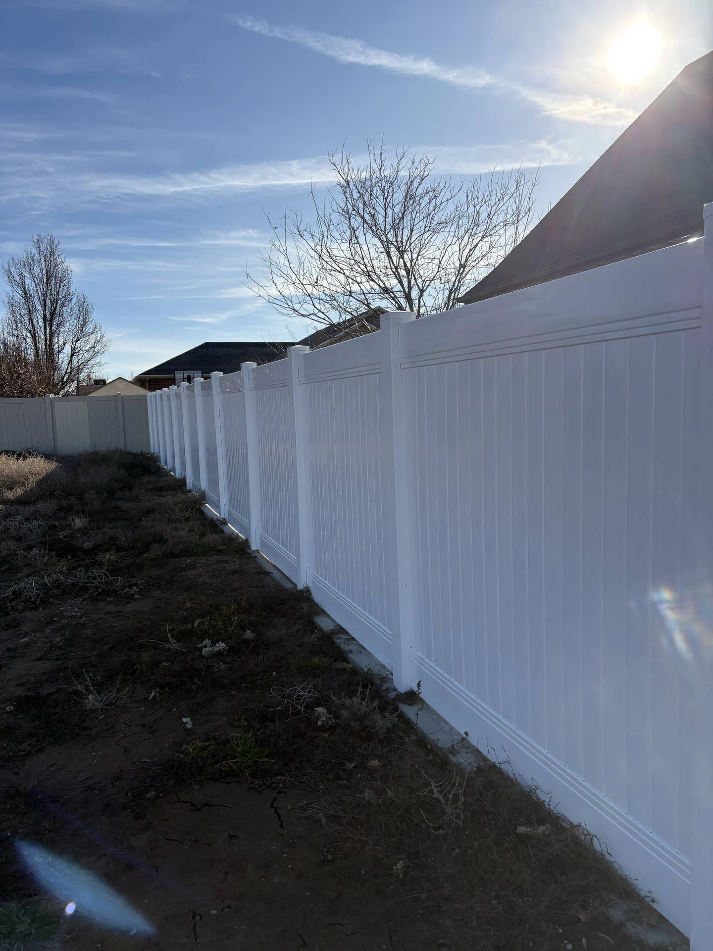 White Vinyl Privacy Fence with Black Accents Clinton UT