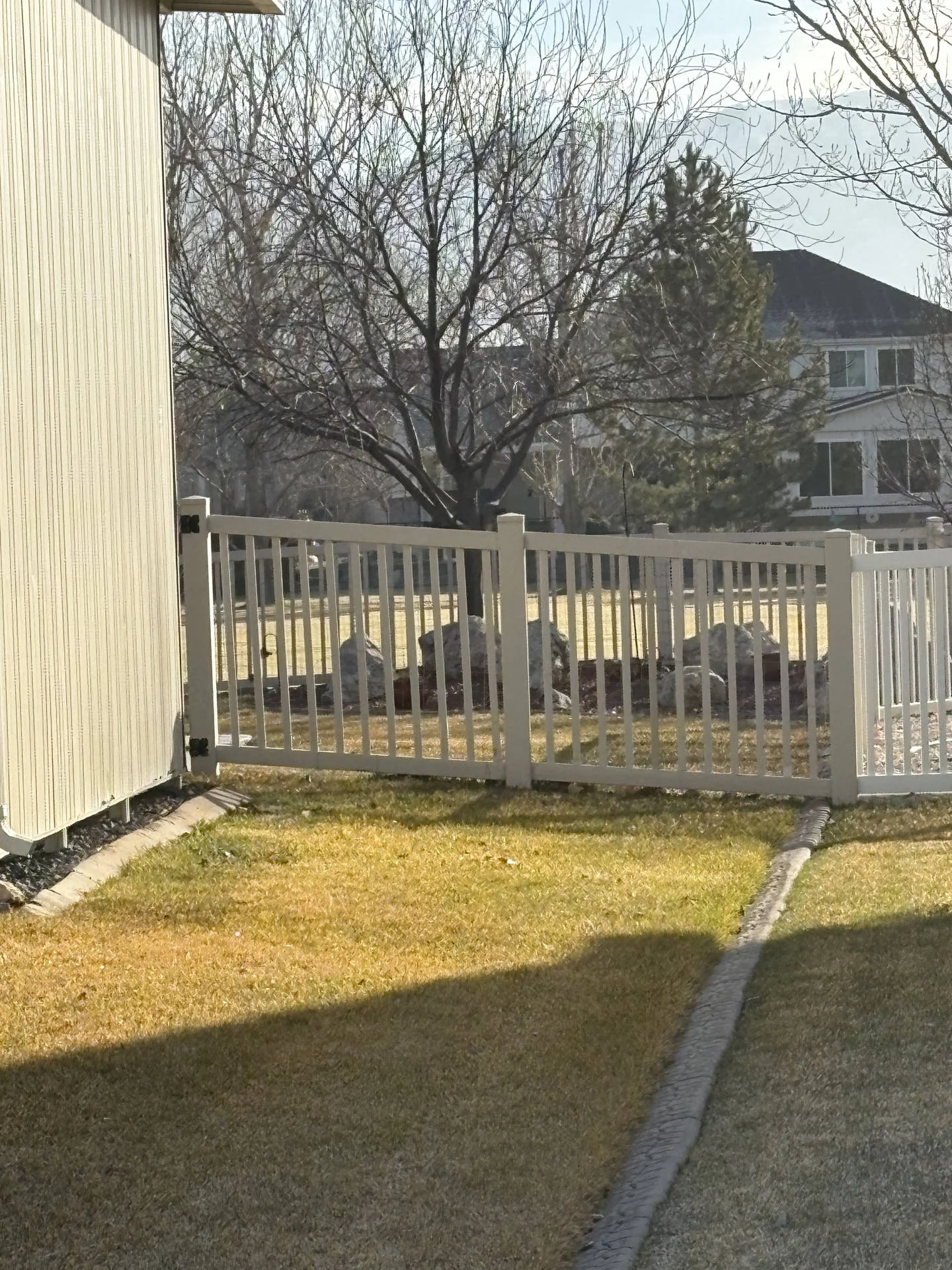 Farr West: Tan Vinyl Semi-Privacy Fence & Gates