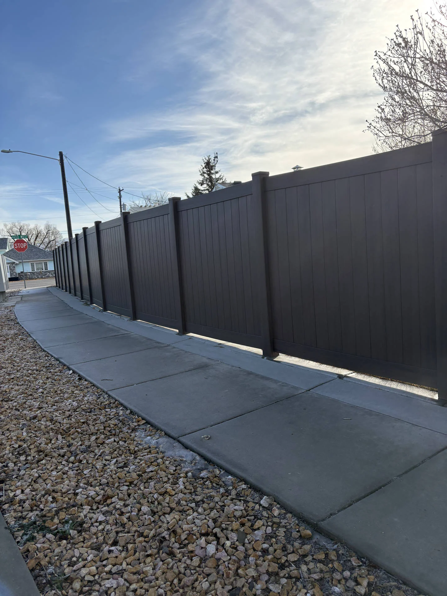 Recent Projects Dark Walnut Vinyl Fence with Robust Gates in Plain City, UT