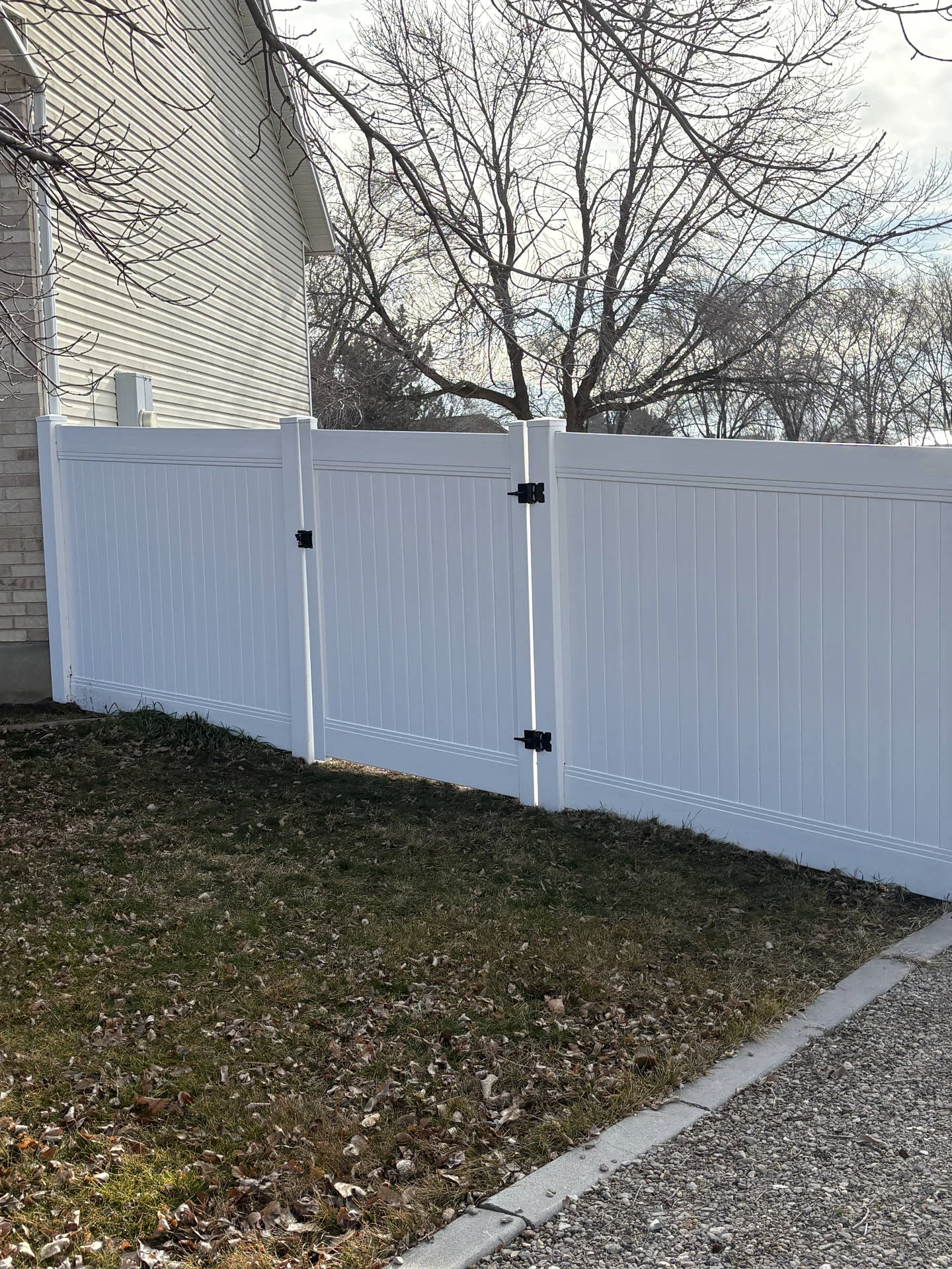 Durable White Vinyl Privacy Fence in Plain City