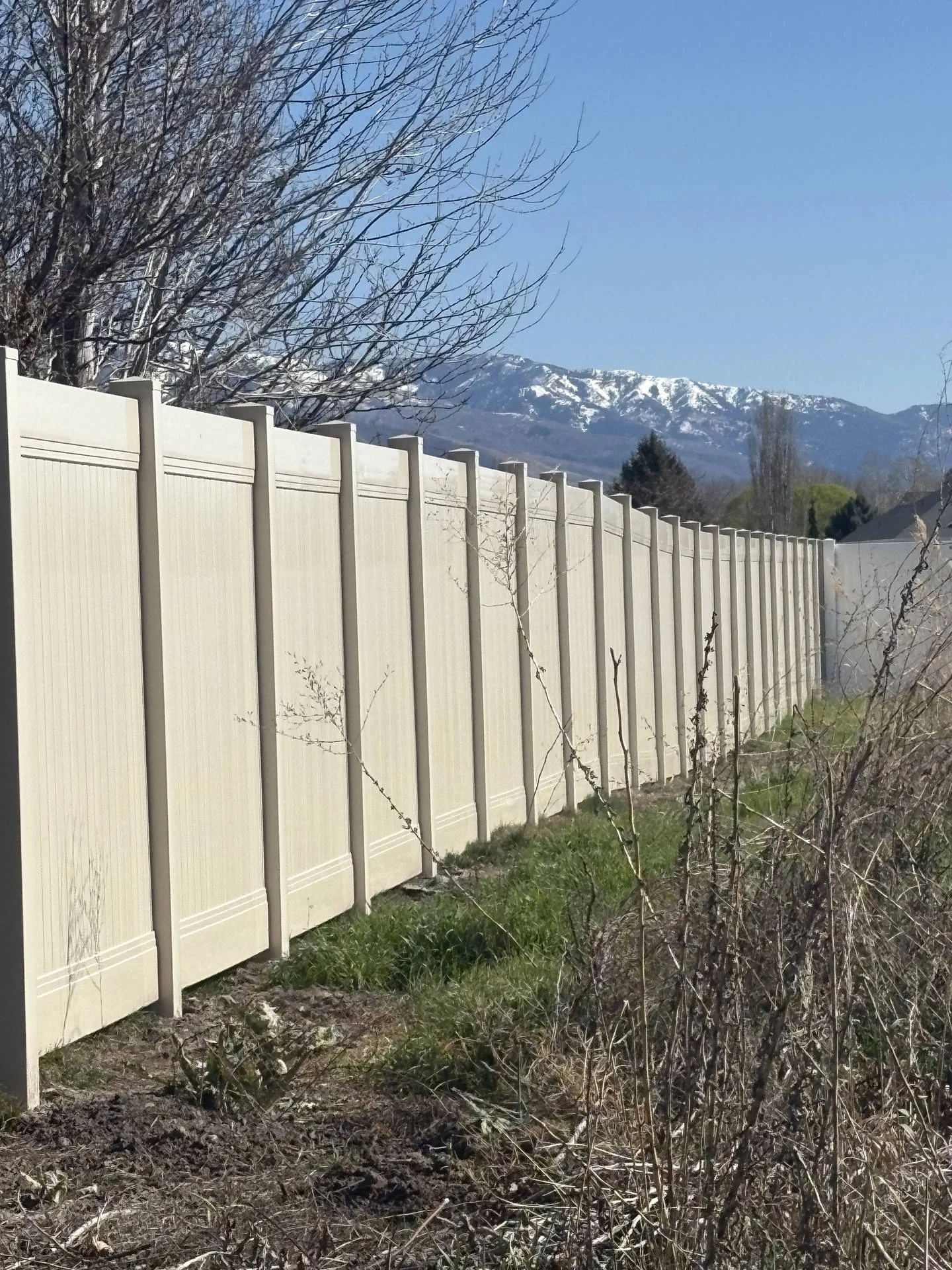 Kaysville Tan Vinyl Privacy Fence with Steel Accents
