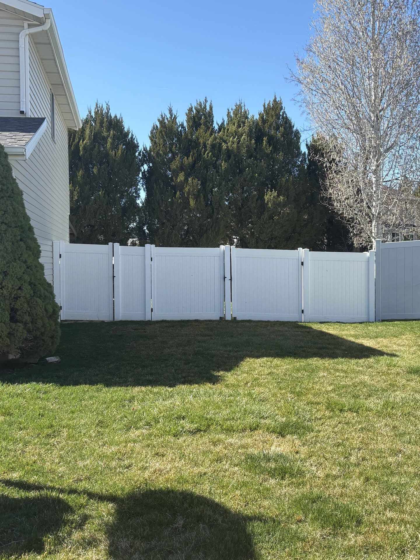 White Vinyl Privacy Fence Installation | Layton, UT