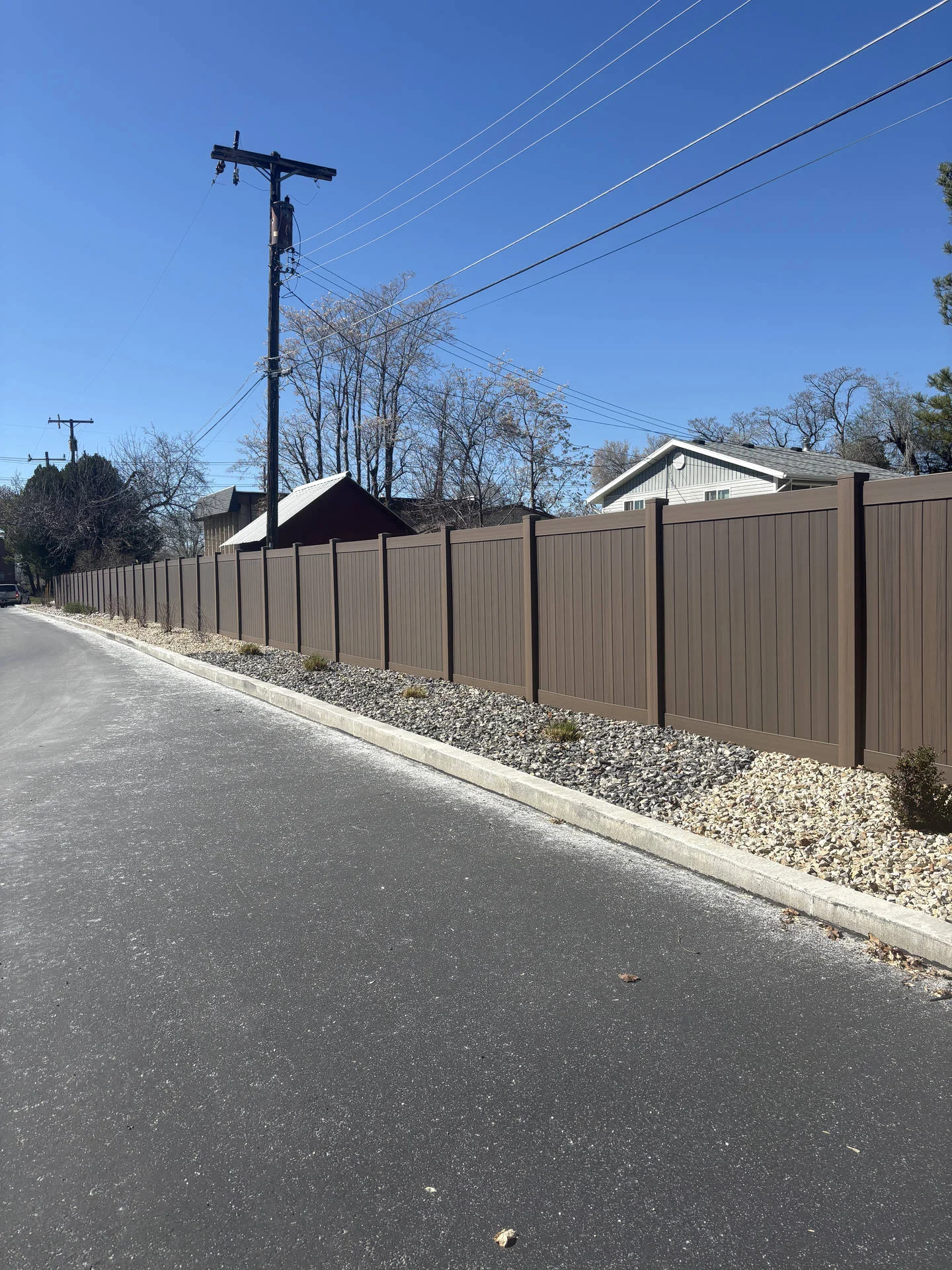 Layton UT: Dark Walnut Vinyl Privacy Fence Installation