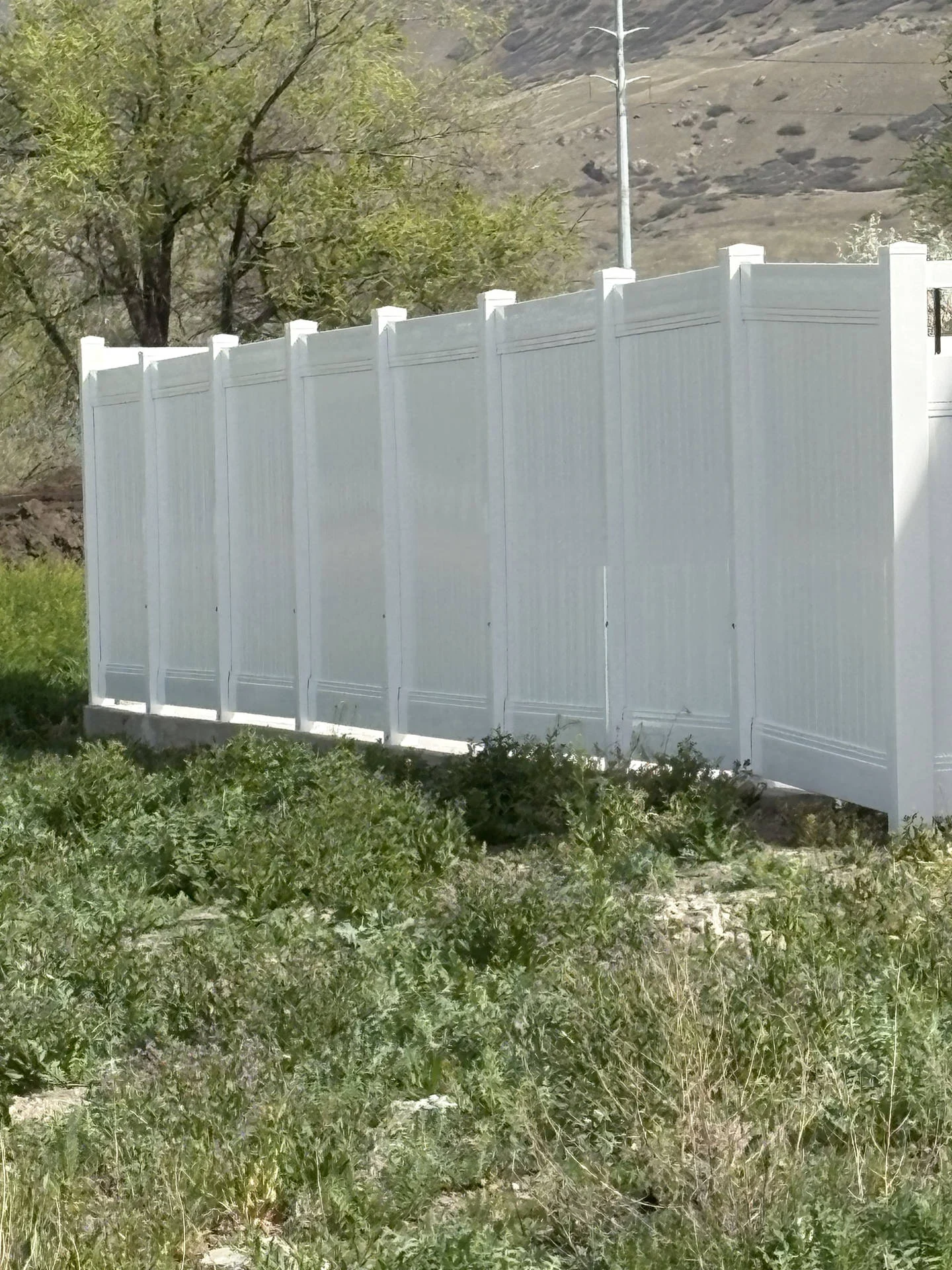 Farmington White Vinyl Privacy Fence with Black Accents