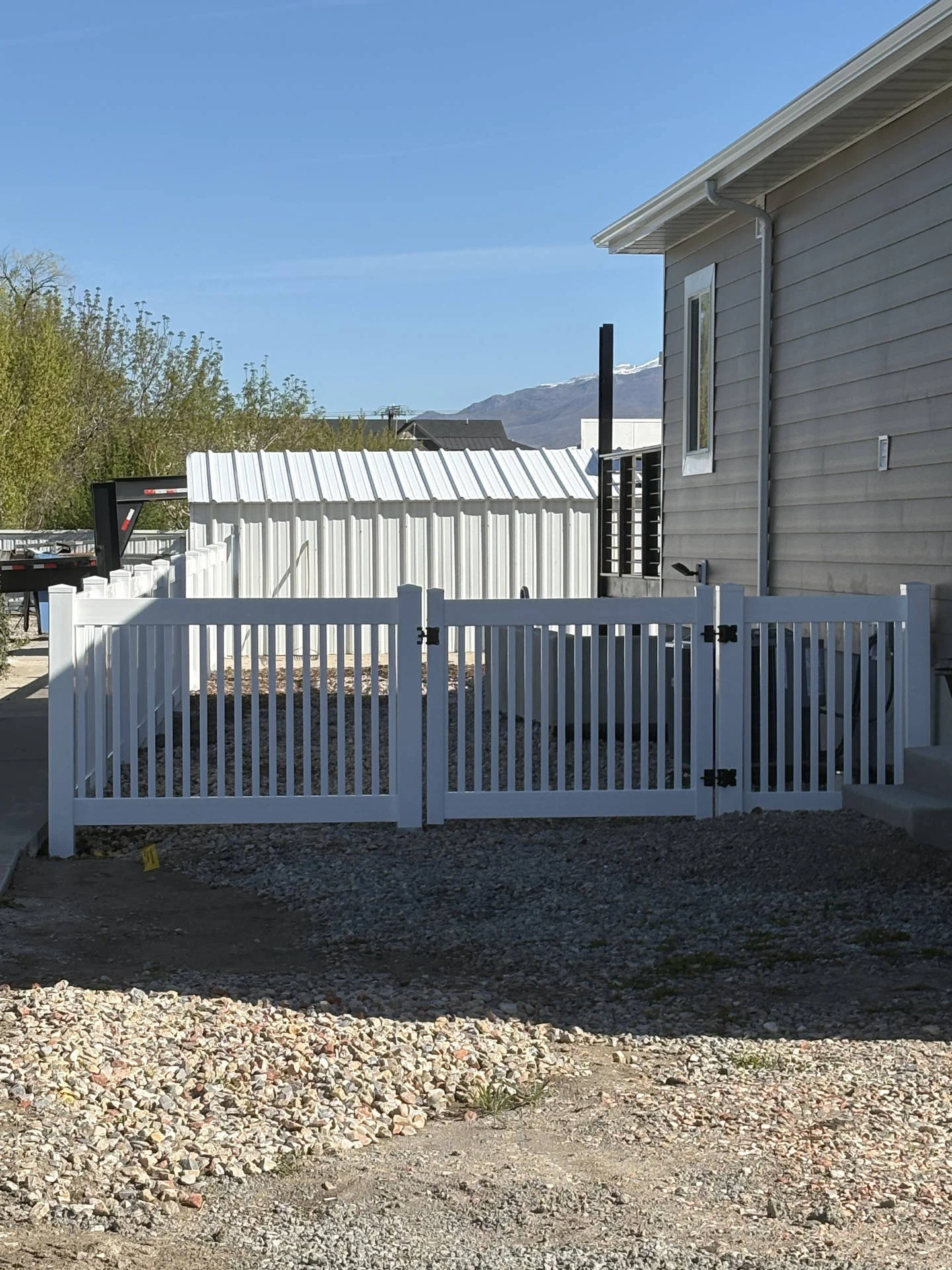 Recent Projects Woods Cross White Vinyl Semi-Private Fence Project