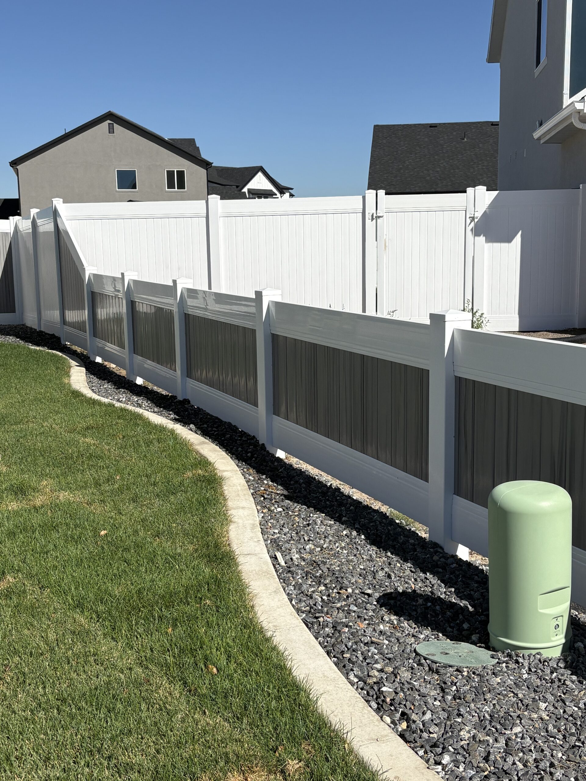 Two-Tone Vinyl and Cedar Privacy Fence in West Point