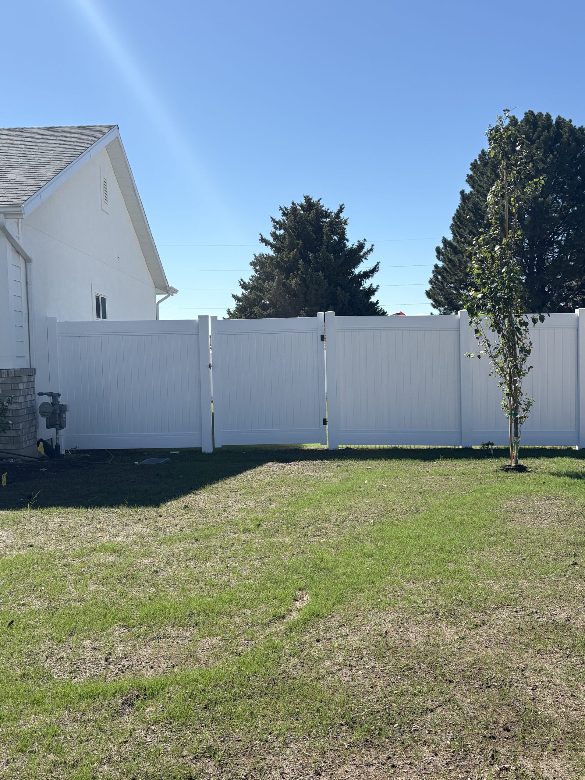 Durable White Vinyl Privacy Fence in West Point