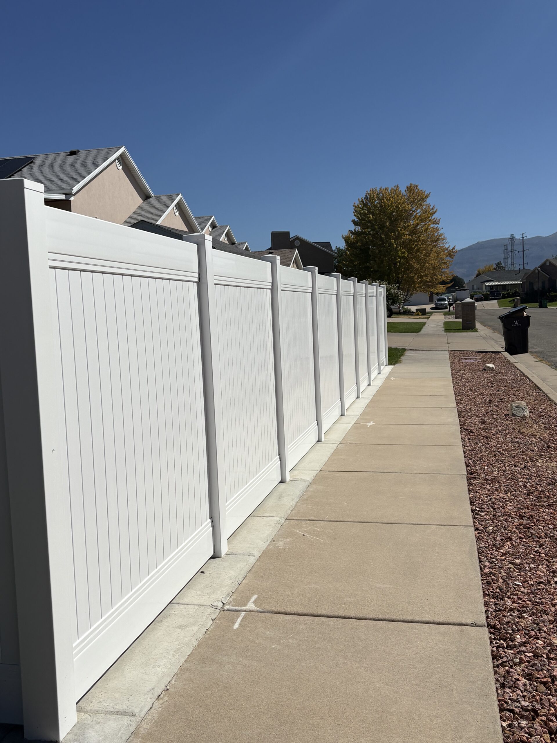Durable White Vinyl Privacy Fence Installation in West Point