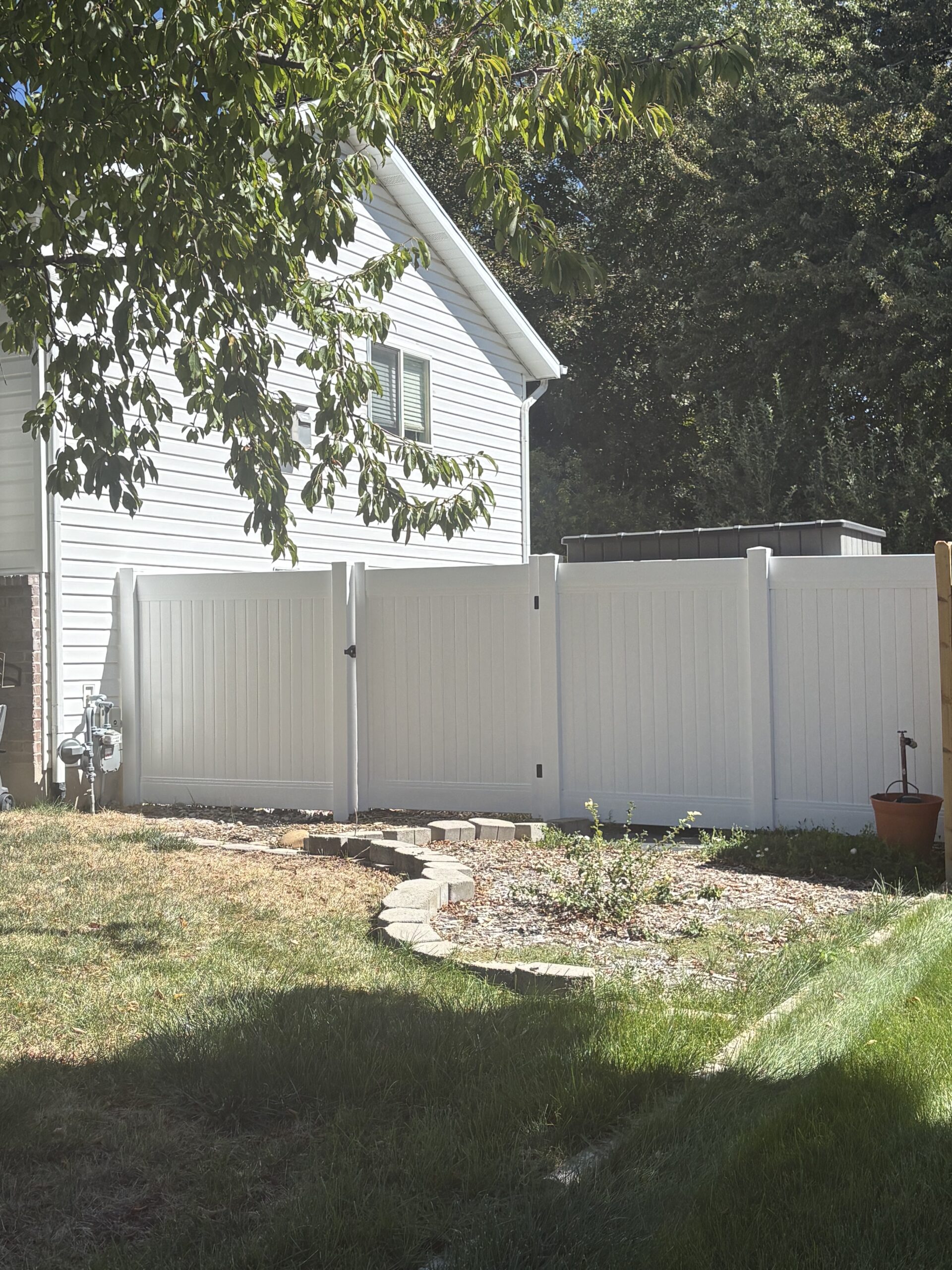 Durable White Vinyl Privacy Fence in Clinton UT
