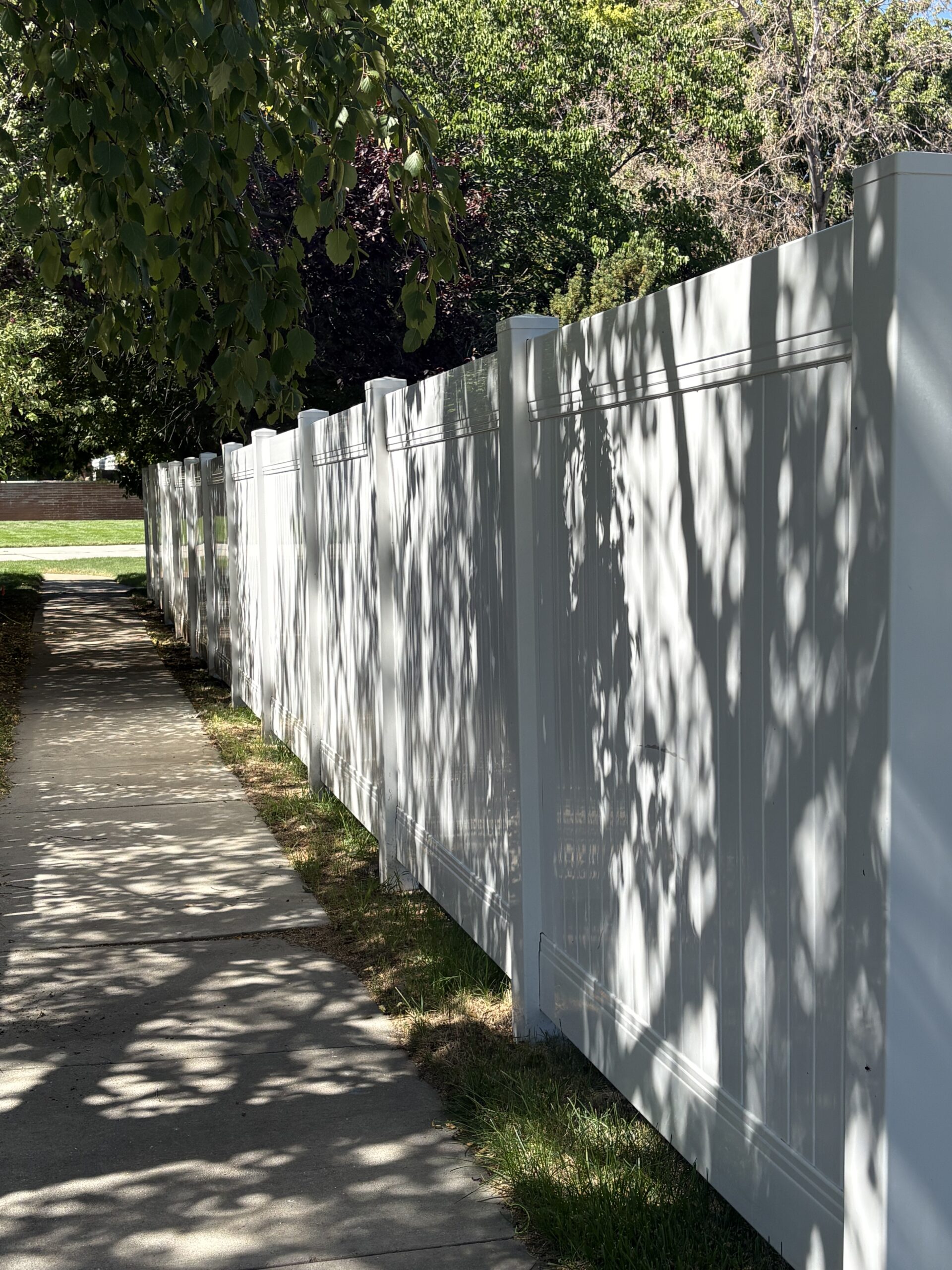 Durable 6-Foot White Vinyl Privacy Fence in Roy, UT