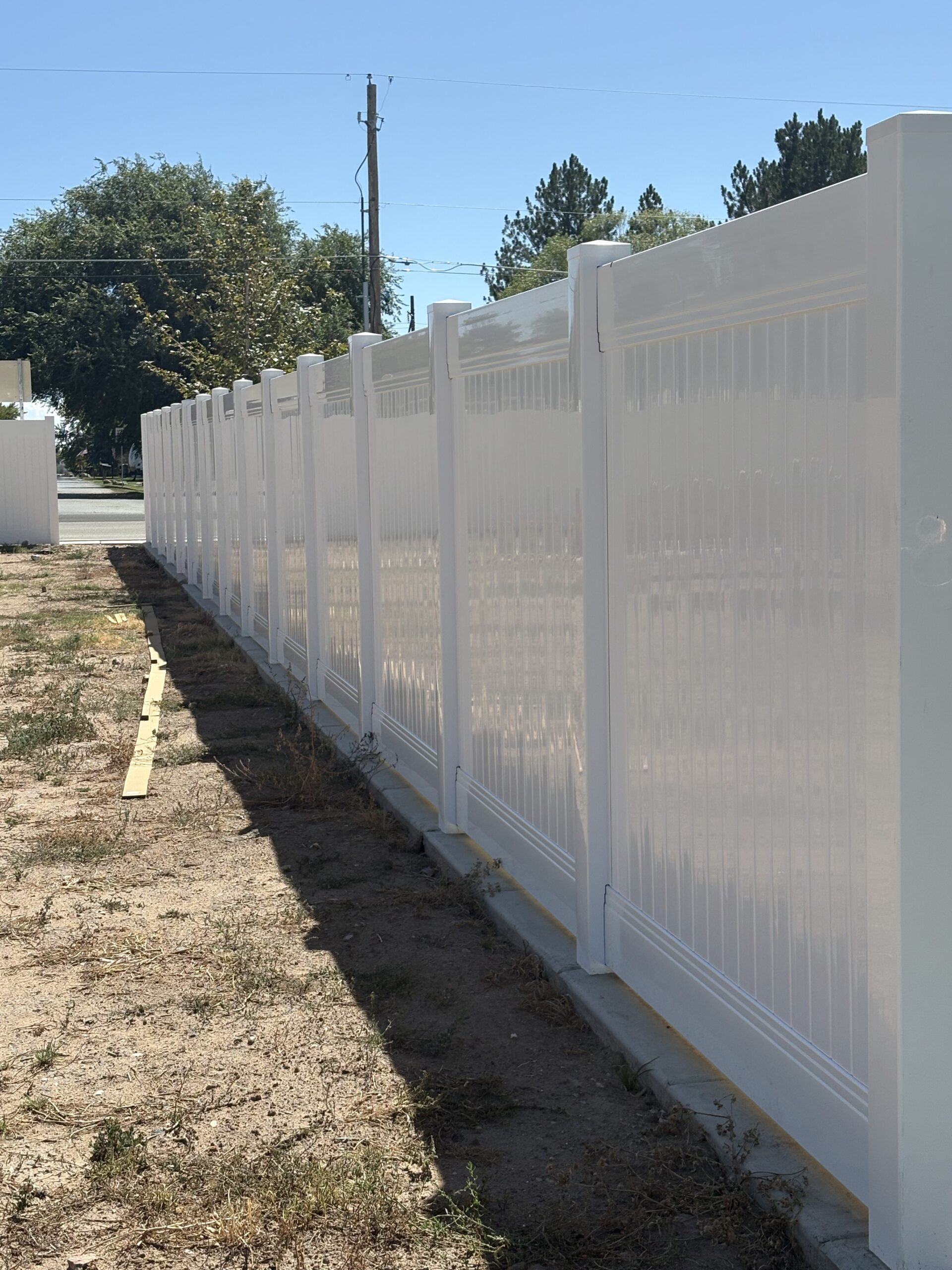 Durable White Vinyl Privacy Fence with Custom Gates in West Haven