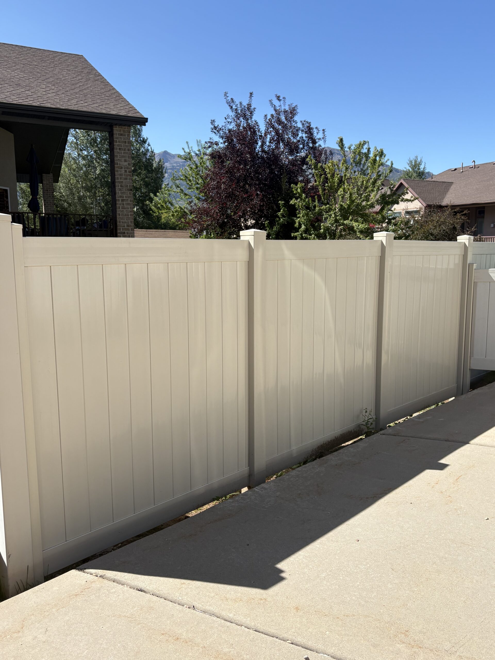 Durable Tan Vinyl Fence Installation in Mountain Green
