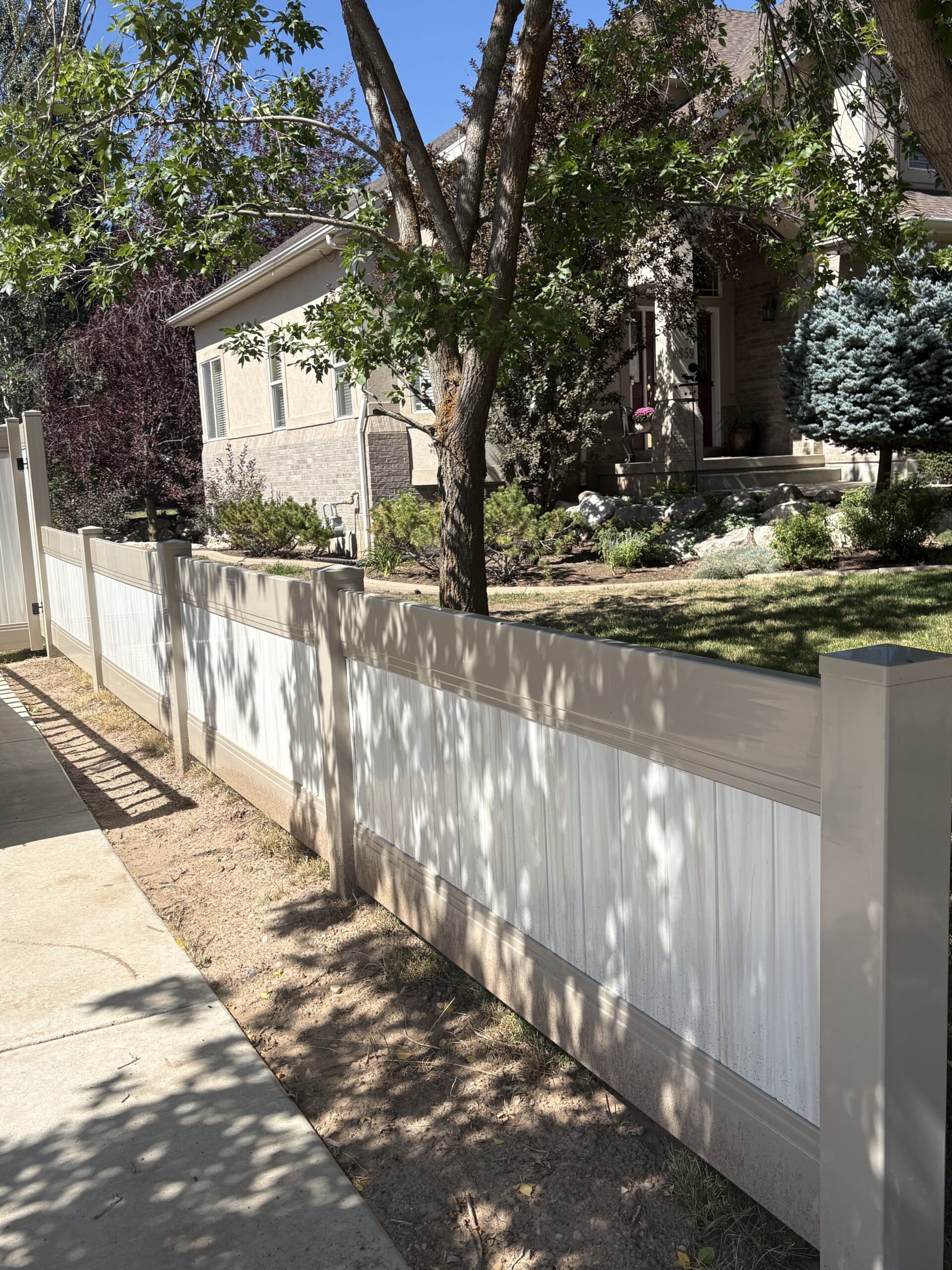 Durable Two-Tone Vinyl Privacy Fence in Mountain Green