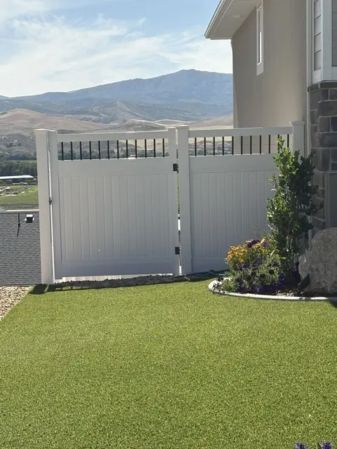 Durable White Vinyl Privacy Fence with Victorian Accent in Morgan UT