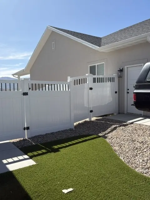Durable White Vinyl Privacy Fence with Victorian Accent in Morgan UT