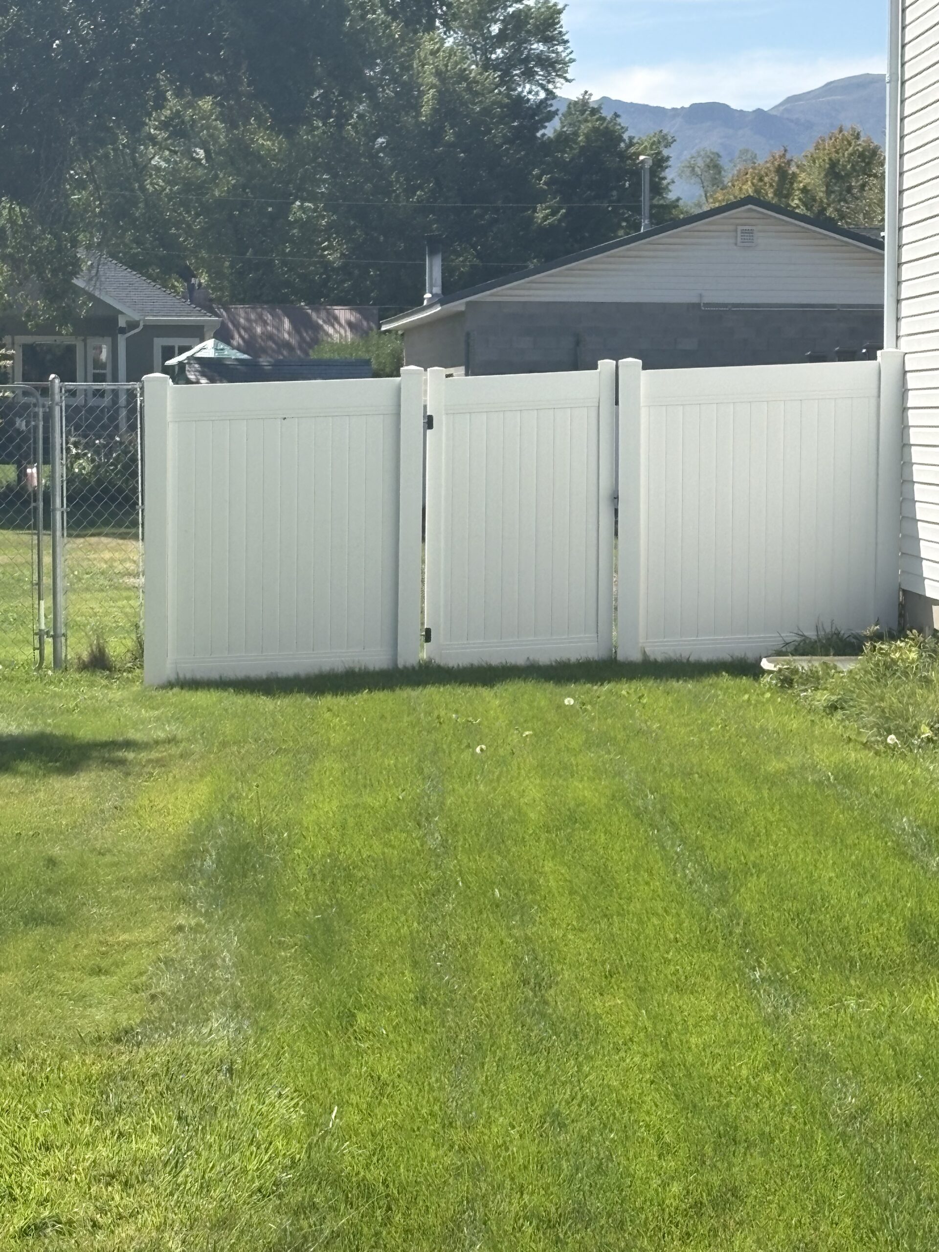 Recent Projects Morgan, UT: Durable 6-Foot White Vinyl Privacy Fence Installation