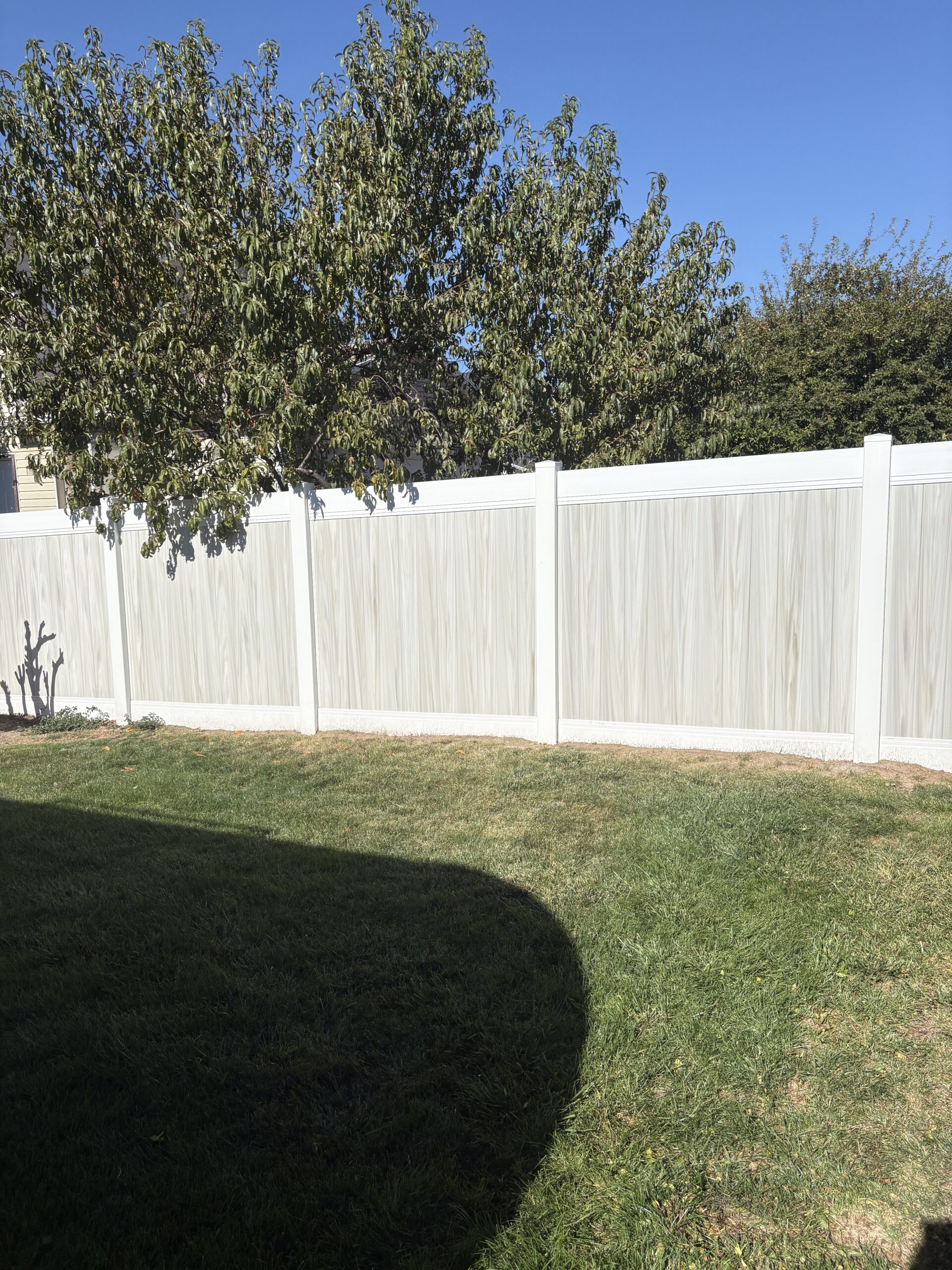 Recent Projects Durable Two-Tone Vinyl Fence Installation in Kaysville